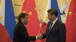 BEIJING, CHINA - OCTOBER 20: Philippine President Rodrigo Duterte, left and Chinese President Xi Jinping shakes hands after a signing ceremony on October 20, 2016 in Beijing, China. Philippine president Rodrigo Duterte is on a four-day state visit to China, his first since taking power in late June, with the aim of improving bilaterial relations.  (Photo by Ng Han Guan-Pool/Getty Images)