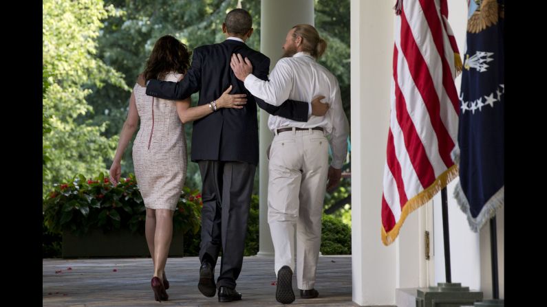 Obama, center, walks with the parents of Army Sgt. Bowe Bergdahl after making a statement about <a href="http://www.cnn.com/2014/05/31/world/asia/afghanistan-bergdahl-release/index.html" target="_blank">Bergdahl's release</a> on May 31, 2014. Bergdahl had been held captive in Afghanistan for nearly five years, and the Taliban released him in exchange for five U.S.-held prisoners.