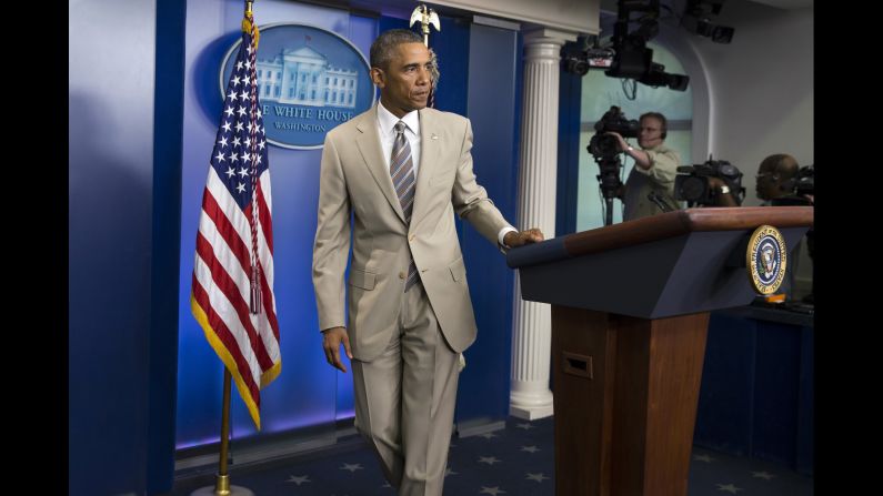 Obama leaves the White House briefing room after speaking about various topics on August 28, 2014. But <a href="index.php?page=&url=http%3A%2F%2Fpoliticalticker.blogs.cnn.com%2F2014%2F08%2F28%2Fthat-time-obama-wore-a-tan-suit-and-twitter-freaked-out%2F" target="_blank">the reaction on Twitter</a> was largely focused on his rarely worn tan suit.