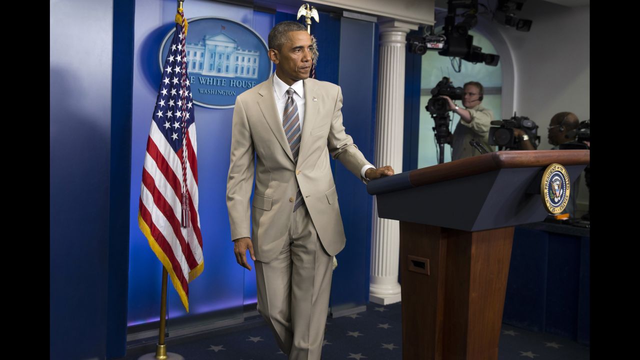 Obama leaves the White House briefing room after speaking about various topics on August 28, 2014. But <a href="http://politicalticker.blogs.cnn.com/2014/08/28/that-time-obama-wore-a-tan-suit-and-twitter-freaked-out/" target="_blank">the reaction on Twitter</a> was largely focused on his rarely worn tan suit.
