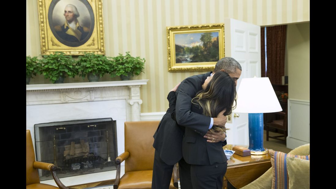 Obama hugs Ebola survivor Nina Pham in the Oval Office on October 24, 2014. Pham, one of two Dallas nurses diagnosed with the virus, was declared Ebola-free after being treated at a hospital in Bethesda, Maryland. The other nurse, Amber Vinson, was treated in Atlanta and also declared Ebola-free.