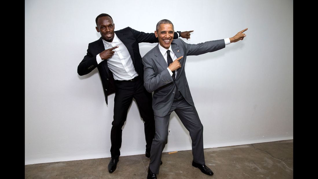 Obama poses with the world's fastest man, Jamaican sprinter Usain Bolt, at an event in Kingston, Jamaica, on April 9, 2015.