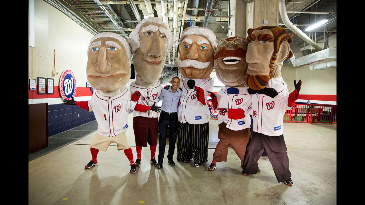 Obama takes a photo with the "Racing Presidents" of the Washington Nationals baseball team on June 11, 2015. The mascots, which race at every Nationals home game, represent former U.S. Presidents -- from left, George Washington, Thomas Jefferson, William Howard Taft, Theodore Roosevelt and Abraham Lincoln. "The President asked the Secret Service to stop the motorcade when he spotted The Racing Presidents," White House Photographer Pete Souza said.