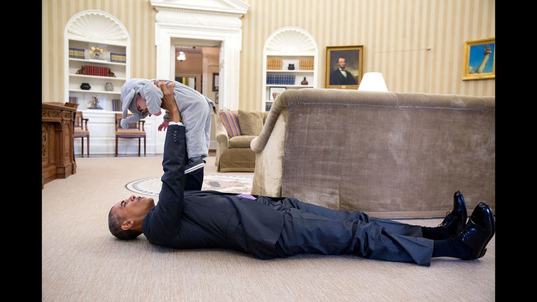 Obama holds Ella Rhodes, daughter of Deputy National Security Advisor Ben Rhodes, in the Oval Office on October 30, 2015. She was wearing an elephant costume for a Halloween event at the White House.