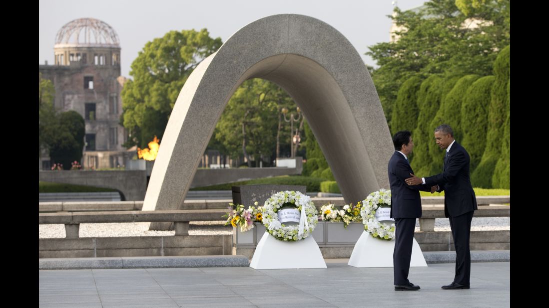 Obama and Japanese Prime Minister Shinzo Abe shake hands after laying wreaths at the Hiroshima Peace Memorial Park in Hiroshima, Japan, on May 27, 2016. <a href="http://www.cnn.com/2016/05/27/politics/obama-hiroshima-japan/" target="_blank">Obama, the first sitting U.S. President to visit Hiroshima,</a> called for a "world without nuclear weapons" during his speech.
