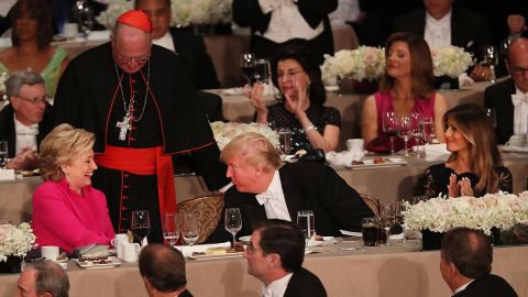 Hillary Clinton speaks briefly with Donald Trump while attending the annual Alfred E. Smith Memorial Foundation Dinner at the Waldorf Astoria on October 20, 2016 in New York City.