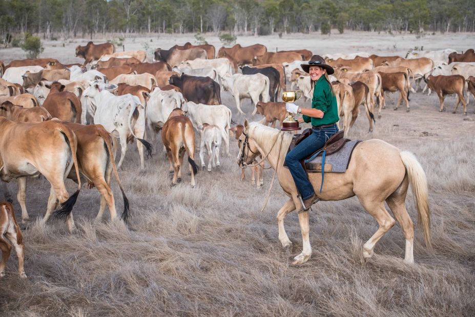 Jillaroo Kelly Smith musters the cattle at Table Top Station outside Croydon, Queensland.