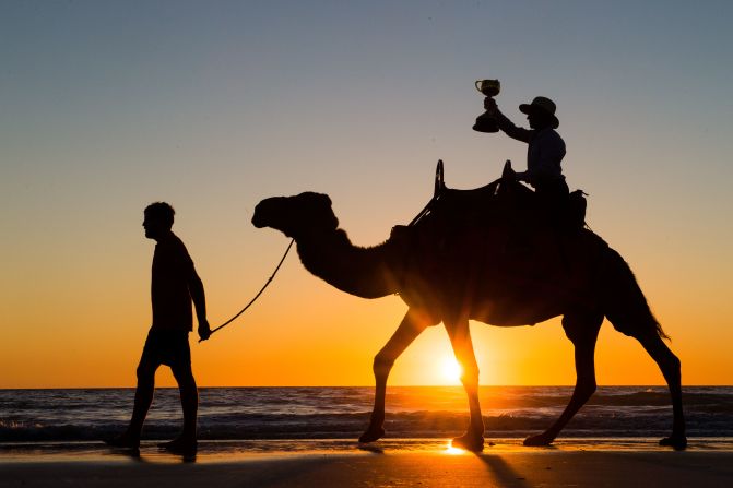 Dual Melbourne Cup winning jockey Jim Cassidy takes the 2016 Emirates Melbourne Cup for a camel ride along Cable Beach, Broome, Western Australia.
