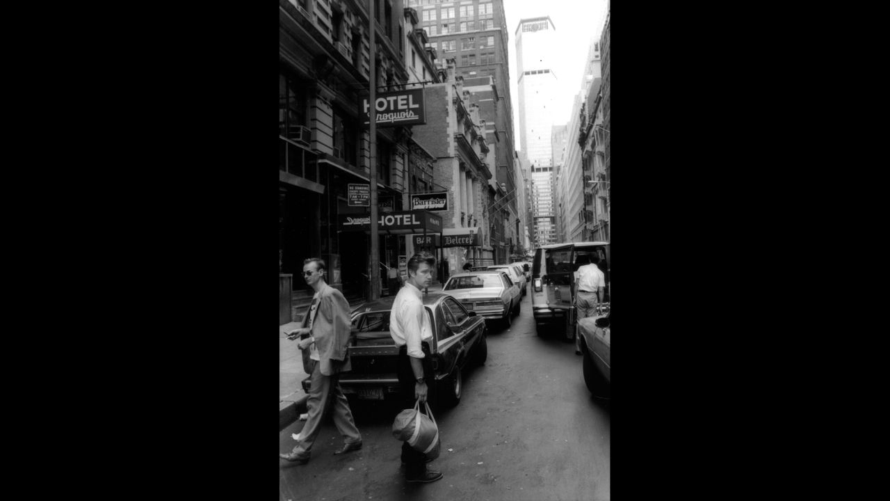 Chris Isaac, center, and his manager, Mark Plummer, wait for a taxi in New York in 1985. "I can still smell the stale beer and fresh piss wafting up from the sidewalk in the humidity," Zagaris said.