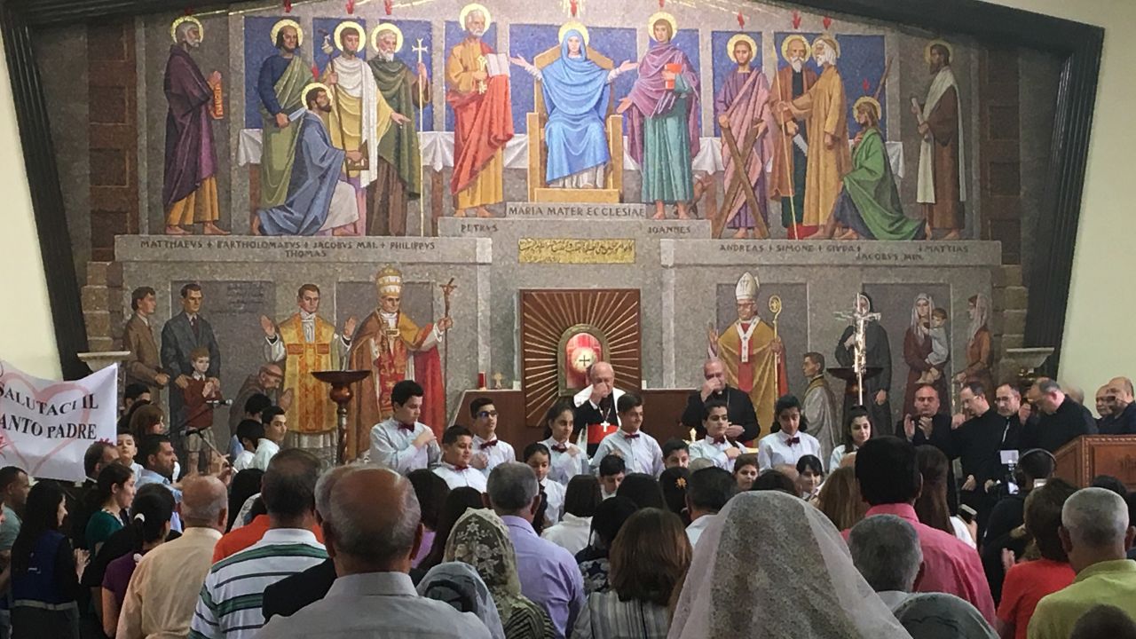 During a Sunday mass at St Mary's which was visited by a Vatican delegation,children from the community sang "Our father who art in heaven" in Aramaic. 