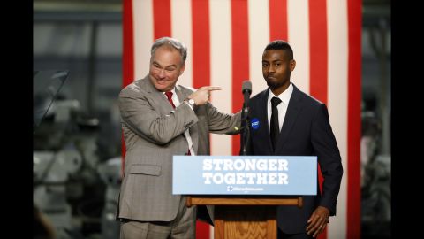 U.S. Sen. Tim Kaine, Hillary Clinton's running mate on the Democratic ticket, points to Jejuan Toney, who introduced Kaine during a campaign stop in Detroit on Tuesday, October 18.