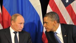 US President Barack Obama (R) meets his Russian counterpart Vladimir Putin (L)  in Los Cabos, Mexico, on June 18, 2012, during the G20 leaders Summit. Obama met today Putin at a G20 summit to discuss differences over what to do about the bloody conflict in Syria. AFP PHOTO/ RIA-NOVOSTI POOL / ALEXEI NIKOLSKY        (Photo credit should read ALEXEI NIKOLSKY/AFP/GettyImages)