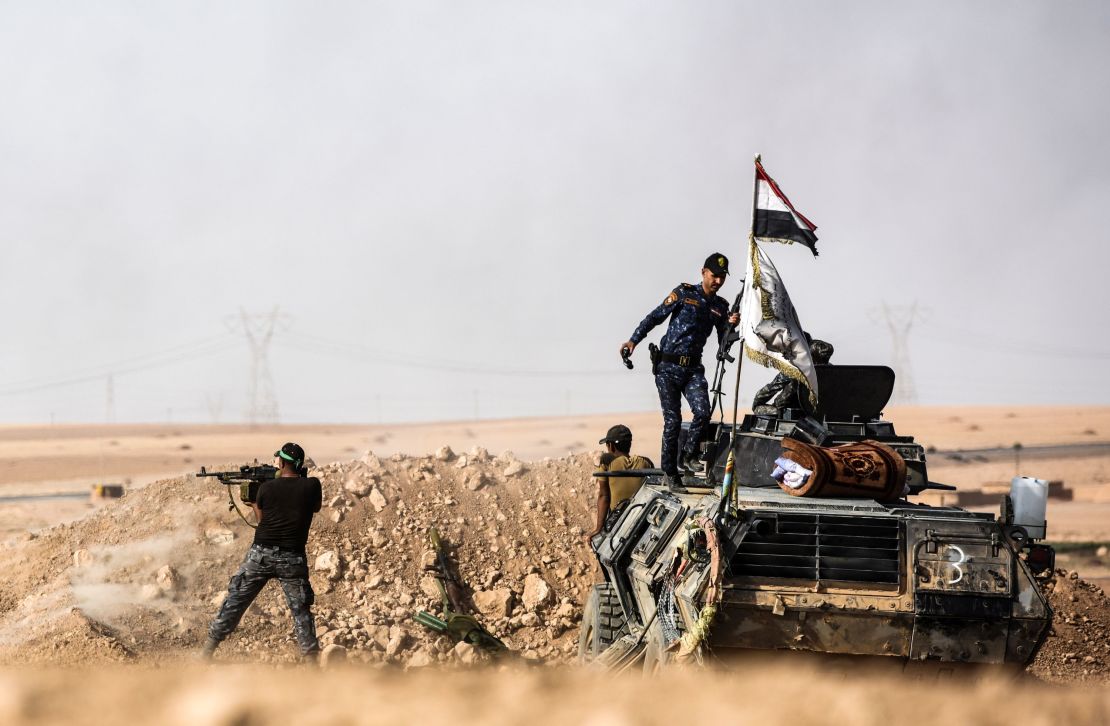 Iraqi forces hold position on the frontline near Tall al-Tibah on Friday