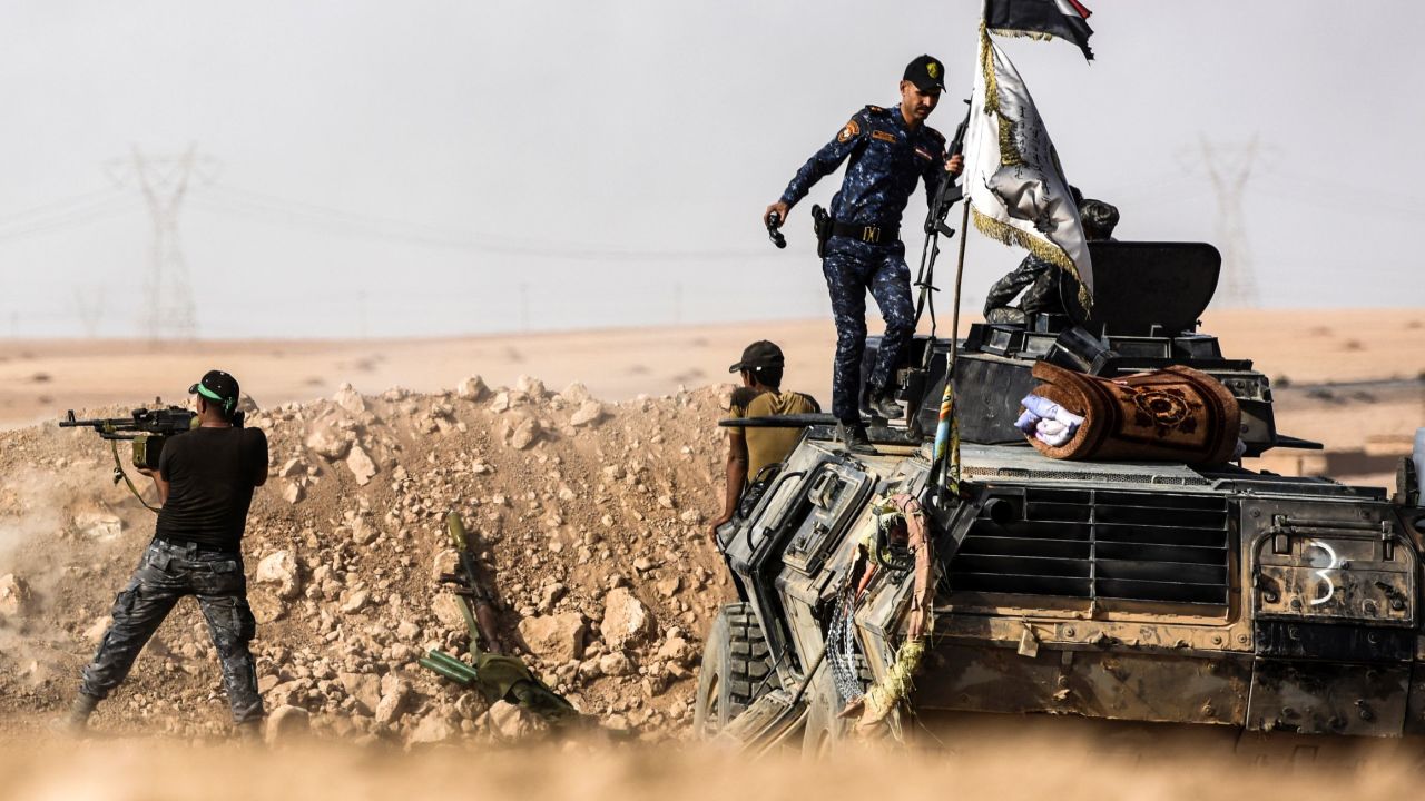 Iraqi forces hold position on the frontline near Tall al-Tibah on Friday