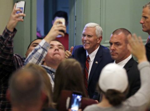 Republican vice presidential candidate Mike Pence greets supporters at a campaign event on, Friday, October 21.