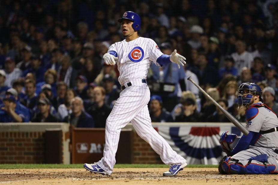 Willson Contreras of the Chicago Cubs hits a solo home run in the fourth inning.