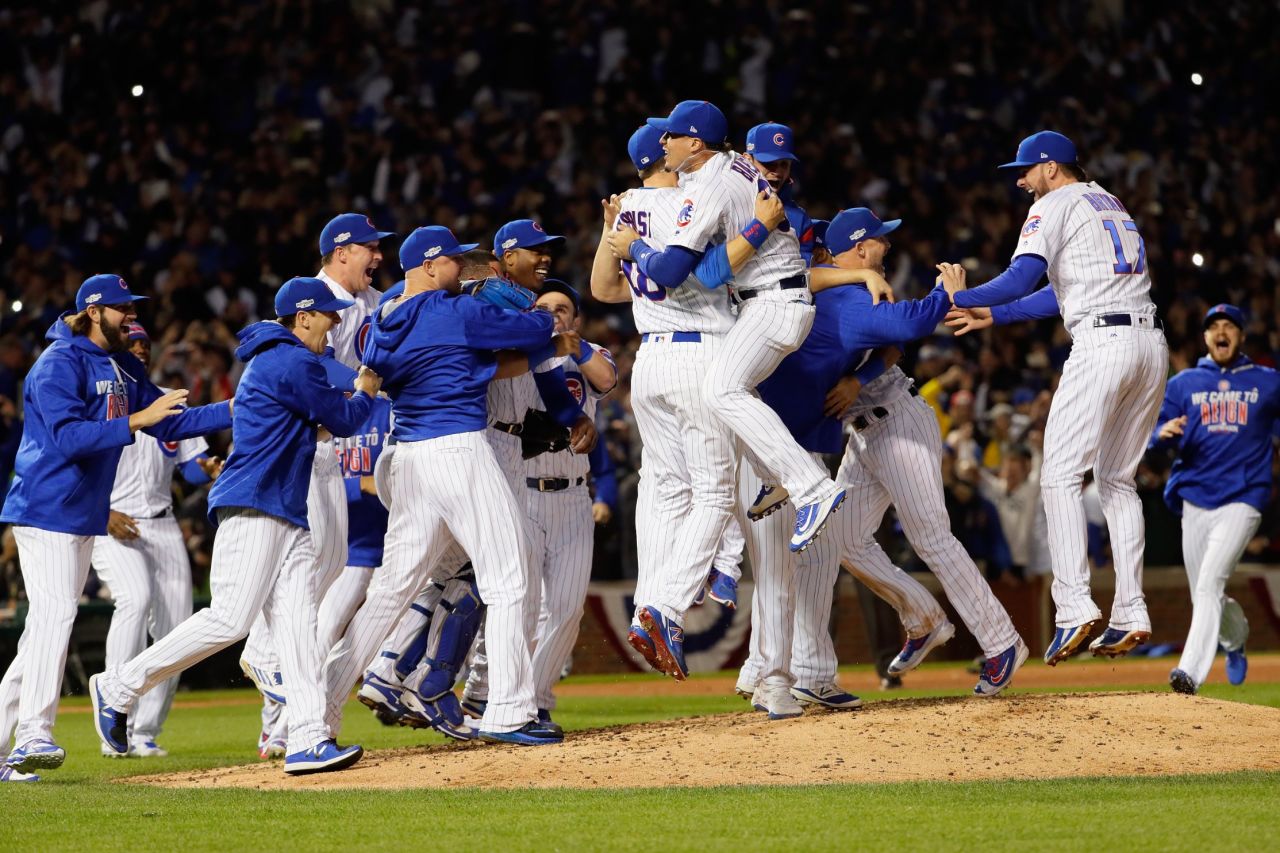 The Chicago Cubs celebrate after defeating the Los Angeles Dodgers 5-0 in Game 6 of the National League Championship Series to advance to the World Series against the Cleveland Indians, at Wrigley Field on October 22, 2016 in Chicago.  