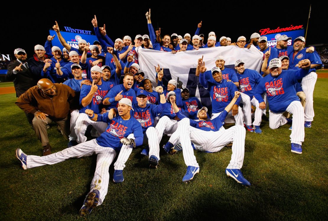 The Chicago Cubs pose after defeating the Los Angeles Dodgers to advance to the World Series. 