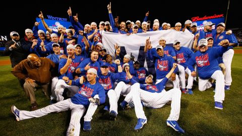 The Chicago Cubs pose after defeating the Los Angeles Dodgers to advance to the World Series. 