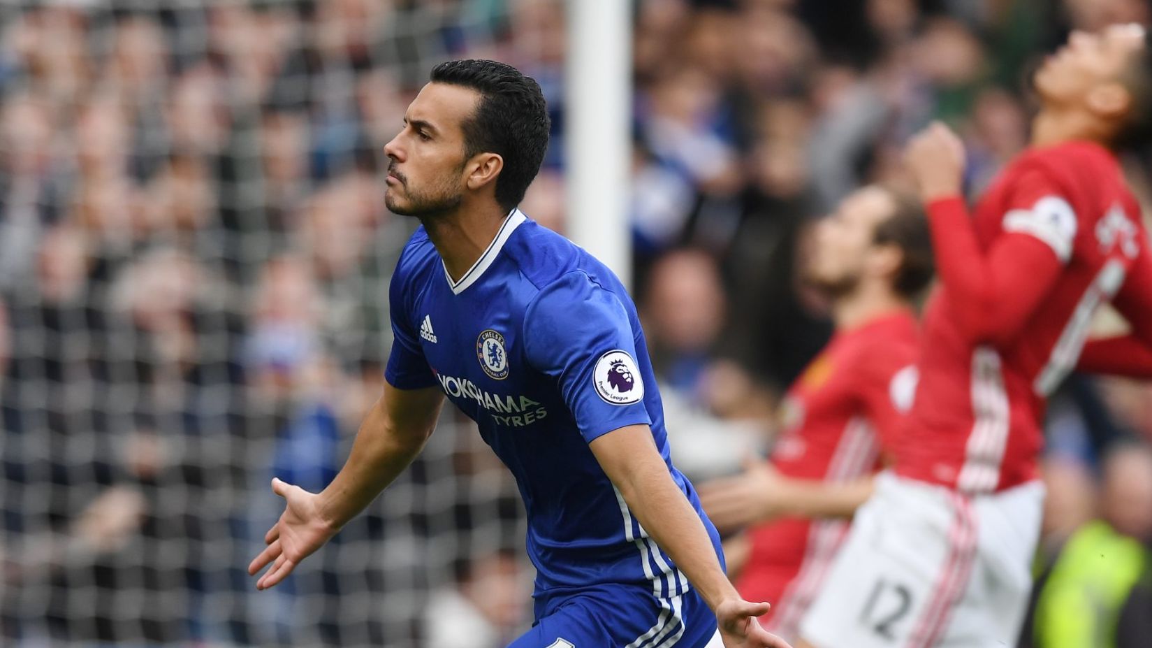 Pedro celebrates scoring his quick fire opener for Chelsea against Manchester United at Stamford Bridge. 