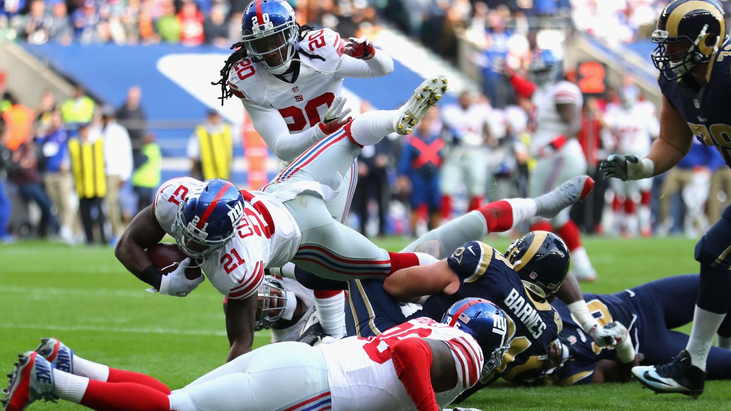 Landon Collins of  the New York Giants dives over for his touchdown after a dazzling return run at Twickenham. 