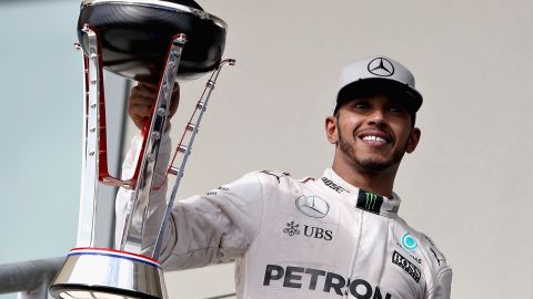 Lewis Hamilton lifts the trophy after a superb victory at the Circuit of The Americas.