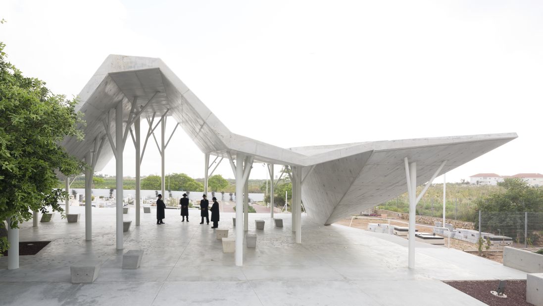 This geometric structure, designed by Ron Shenkin Studio for Architecture and Design, is located in Pardesia, Israel. It was built as a place for mourners to converge, read eulogies and share memories prior to burial at the the neighboring cemetery.