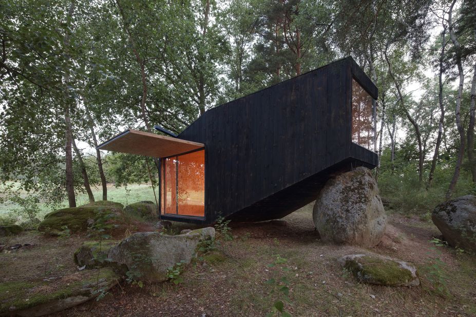 Uhlik Architekti designed this hideaway in the forests of Central Bohemia, in the Czech Republic. The client requested a place to escape a demanding job in Prague that would have a limited impact on the environment.
