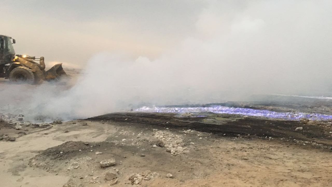 Smoke rises at the sulfur facility near Qayyara that was torched by ISIS militants.