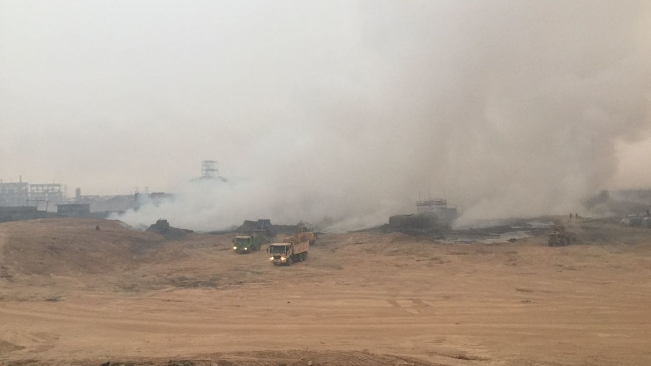 Emergency services are working to extinguish the fire at the sulfur facility near Qayyara.