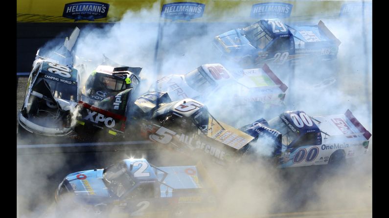 NASCAR trucks pile up during a wreck in Talladega, Alabama, on Saturday, October 22. No drivers were seriously hurt.
