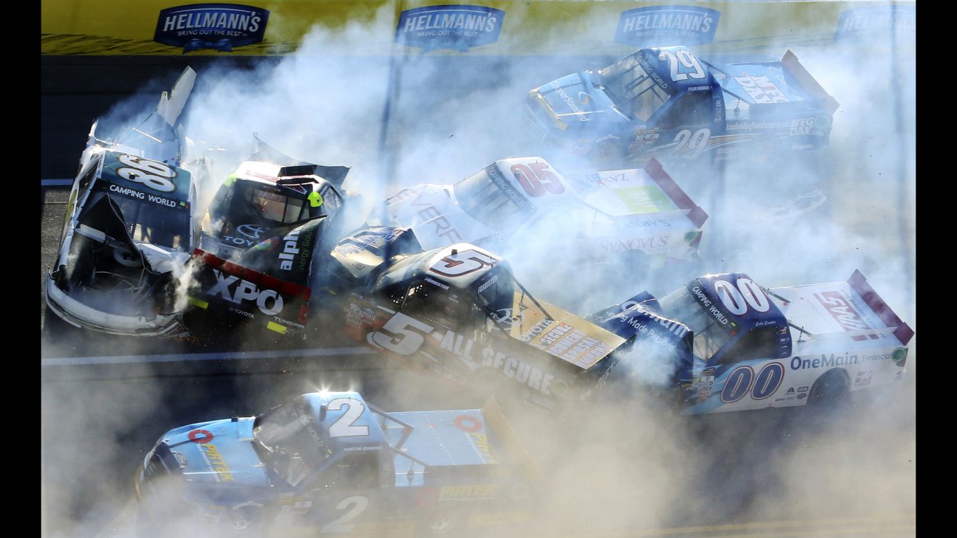 NASCAR trucks pile up during a wreck in Talladega, Alabama, on Saturday, October 22. No drivers were seriously hurt.