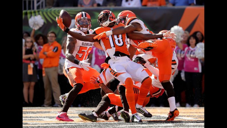 Cincinnati wide receiver A.J. Green catches a pass at the end of the first half against Cleveland on Sunday, October 23.