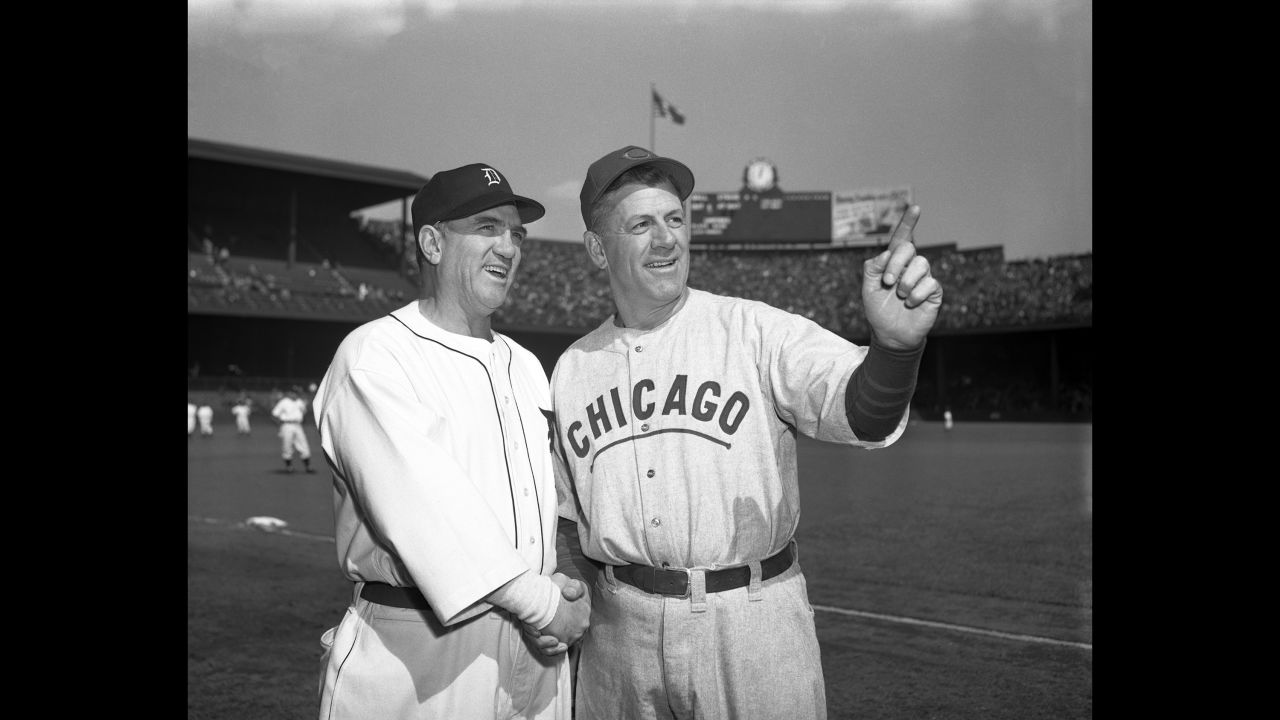 Detroit Tigers manager Steve O'Neill and Chicago Cubs manager Charley Grimm shake hands on the field at Briggs Stadium prior to the first game.<br /><br /><br />
