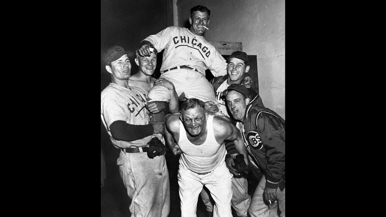 Chicago Cubs players hoist manager Charlie Grimm on their shoulders as they celebrate in the clubhouse after clinching the National League pennant on September 29, 1945. That year would be the last Cubs appearance in the World Series until 2016.