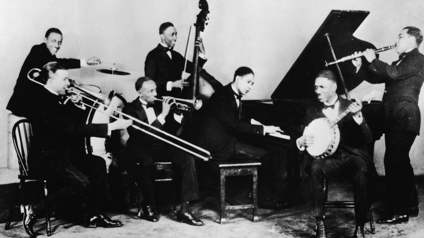 Jazz was in its infancy in 1908. Here's jazz pianist Jelly Roll Morton and his band, the Red Hot Peppers, around 1926.