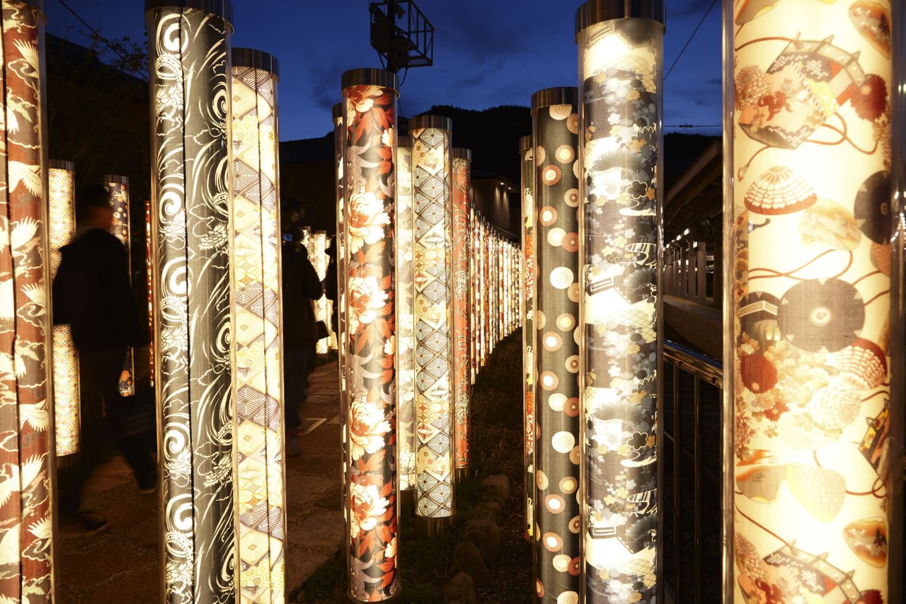 <strong>Kimono Forest: </strong>This beautiful "forest" of two-meter high pillars, located outside the Randen tram station in Arashiyama, showcases various kimono textiles.  