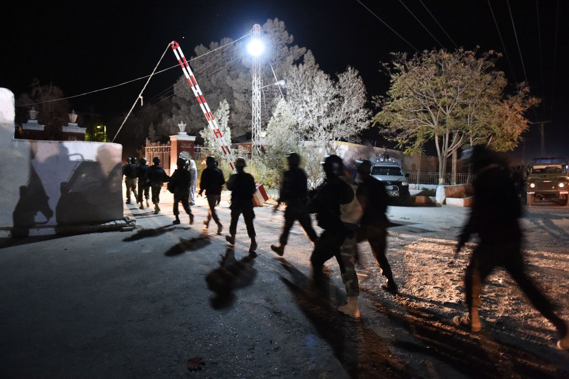 Pakistani soldiers arrive at the police training academy in Quetta after militants attacked Monday night.