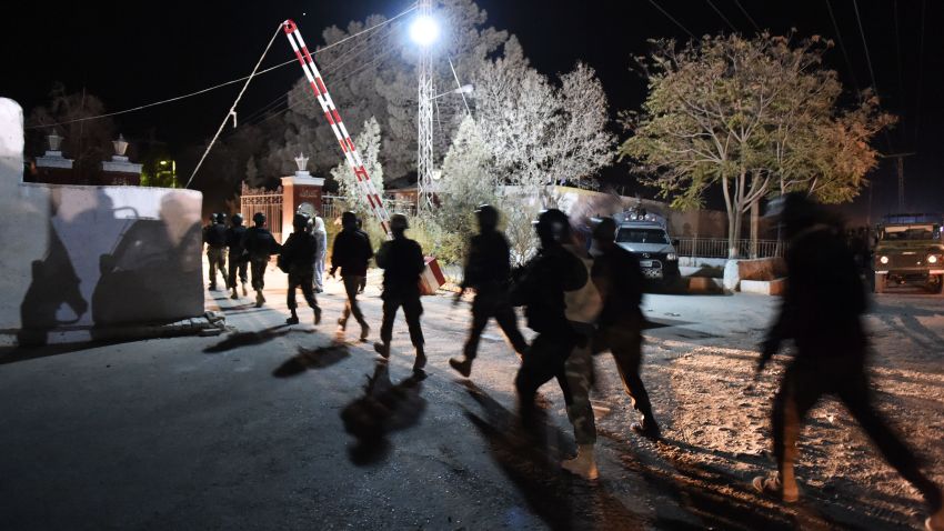 Pakistani army soldiers arrive at the Balochistan Police Training College in Quetta on October 24, 2016, after militants attacked the police academy.
Pakistani troops backed by helicopters have launched a major operation against militants who stormed a police academy in the country's restive southwest late today, rescuing hundreds of trapped cadets and killing two attackers, officials said. The attack on the Balochistan Police College, located 20 kilometres east of Quetta city centre, began at around 11:30 pm (1830 GMT), with gunfire continuing to ring out from the site hours later. / AFP / BANARAS KHAN        (Photo credit should read BANARAS KHAN/AFP/Getty Images)