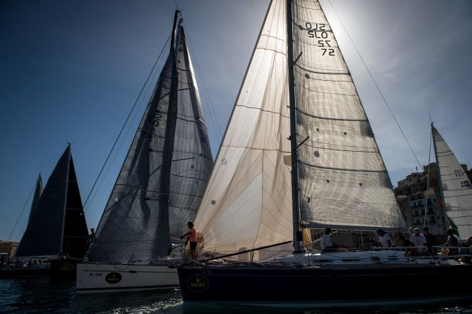 The sun shines through the sails of yachts during what is one of the world's most spectacular races.