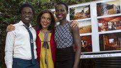 TO GO WITH AFP STORY by Amy Fallon
(From R) Mexican-Kenyan Oscar winning actress Lupita Nyongo, Indian film maker Mira Nair and Ugandan national chess champion Phiona Mutesi pose in Kampala on March 28, 2015. Mutesi's tale of triumph over adversity is being turned into a Hollywood epic called 'Queen of Katwe', with Oscar-winning Kenyan actress Lupita Nyong'o tipped to play her mother AFP PHOTO/ ISAAC KASAMANI        (Photo credit should read ISAAC KASAMANI/AFP/Getty Images)
