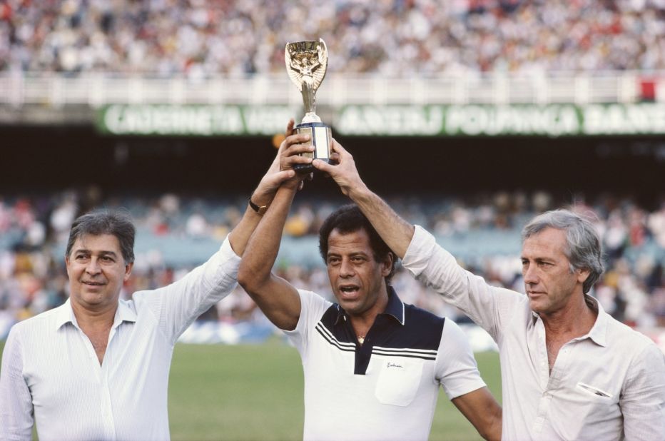 Alberto is pictured lifting the Jules Rimet FIFA World Cup trophy, alongside former Brazilian winning captains Mauro Ramos (1962) and Hilderaldo Bellini (1958) at the Maracana Stadium.