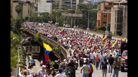 Opponents of President Nicolas Maduro's government, led by Lilian Tintori, wife of imprisoned opposition Leopoldo Lopez, gather to protest the suspension of the recall referendum.