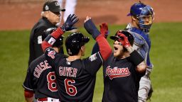 Roberto Perez of the Cleveland Indians celebrates with Lonnie Chisenhall and Brandon Guyer after hitting a three-run home run during the eighth inning against the Chicago Cubs in Game One of the 2016 World Series at Progressive Field on October 25, 2016 in Cleveland, Ohio. 