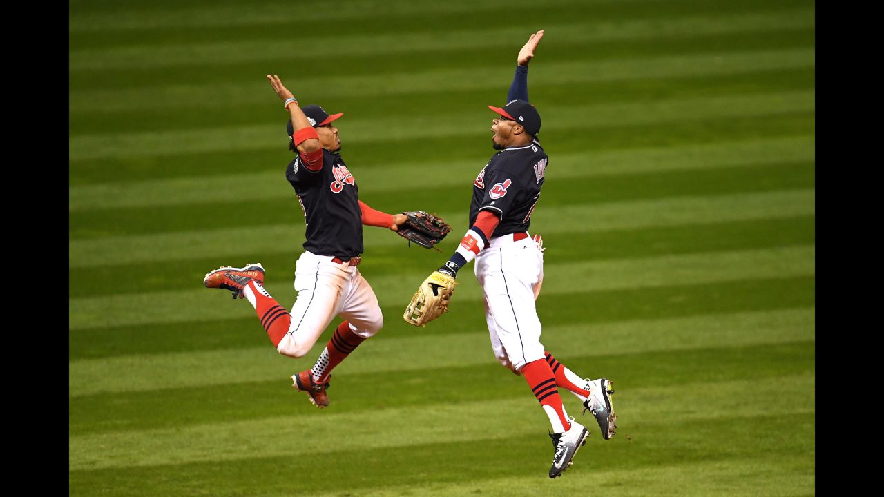 Francisco Lindor, left, and Rajai Davis of the Cleveland Indians celebrate after defeating the Chicago Cubs 6-0 in the Game 1.