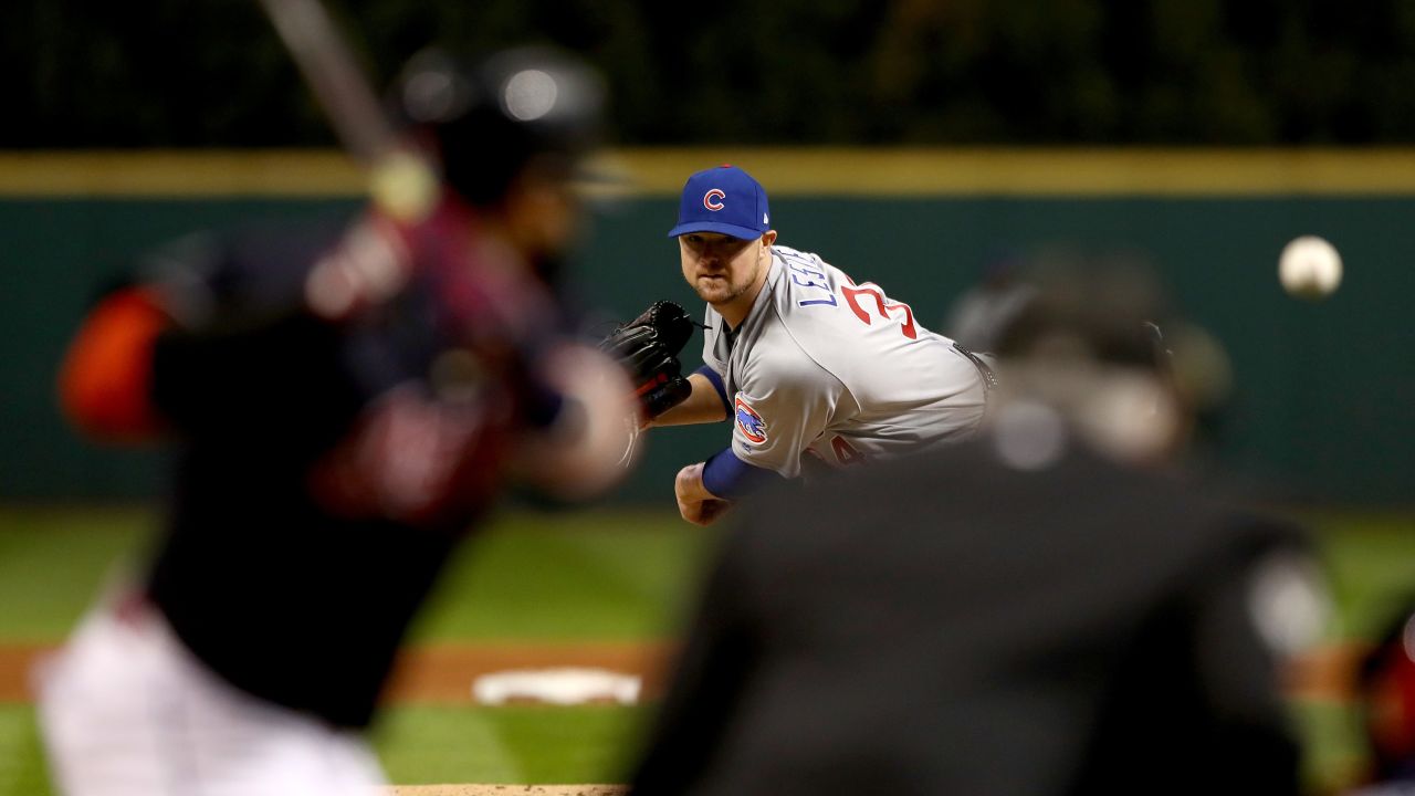 Jon Lester of the Cubs throws a pitch in Game 1.