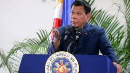 Philippine President Rodrigo Duterte gestures as he speaks at the Davao International Airport after arrving back from a state visit to Brunei and China on October 22, 2016.
Philippine President Rodrigo Duterte said on October 22 he would not sever his nation's alliance with the United States, as he clarified his announcement that he planned to "separate". / AFP / MANMAN DEJETO        (Photo credit should read MANMAN DEJETO/AFP/Getty Images)