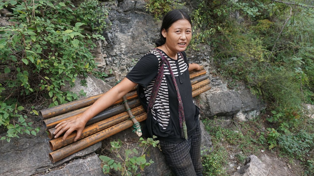 With handrails and a more stable structure, it will also make the journey safer for villagers, who descend and climb the cliff each week to buy groceries and trade their products at the nearest market several miles away. 