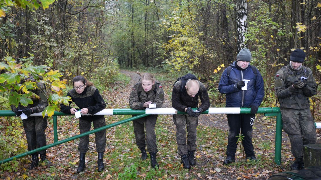 New recruits take a breather after a gruelling training session.