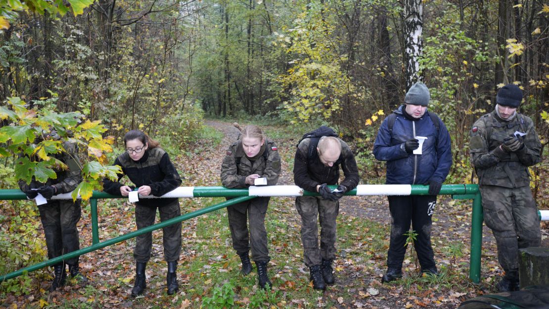 New recruits take a breather after a gruelling training session. 